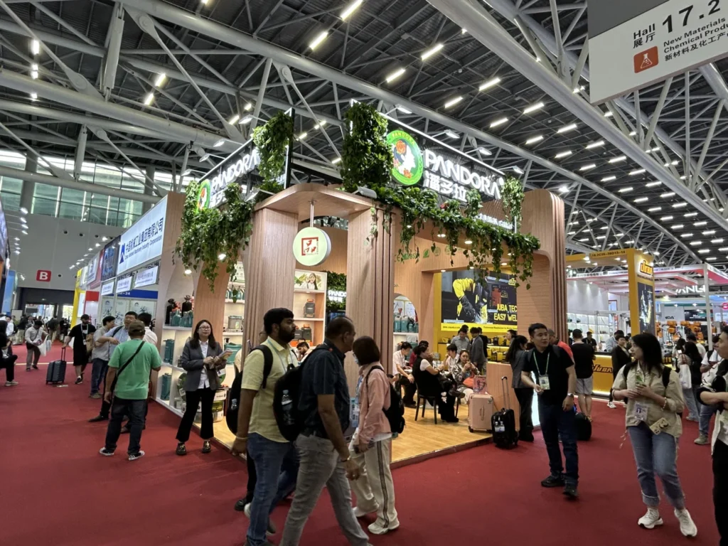 Visitors exploring the PANDORA exhibition stand